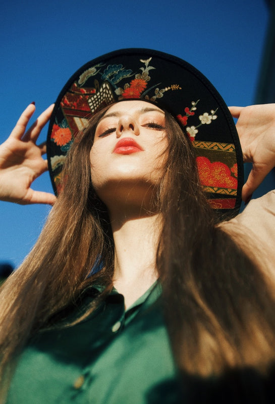 KIMONO HAT — A supreme, sculpted heritage created through a unique fusion of traditional hat-blocking and bespoke couture draping. Meticulously handcrafted from antique and vintage Japanese silk kimono by artisan Keiko Tagai. One-of-a-kind wearable art.